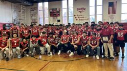 dale olson of milford high named new england patriots high school coach of the week.