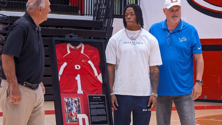 Detroit Lions running back Jahmyr Gibbs has his Dalton High School uniform number retired.